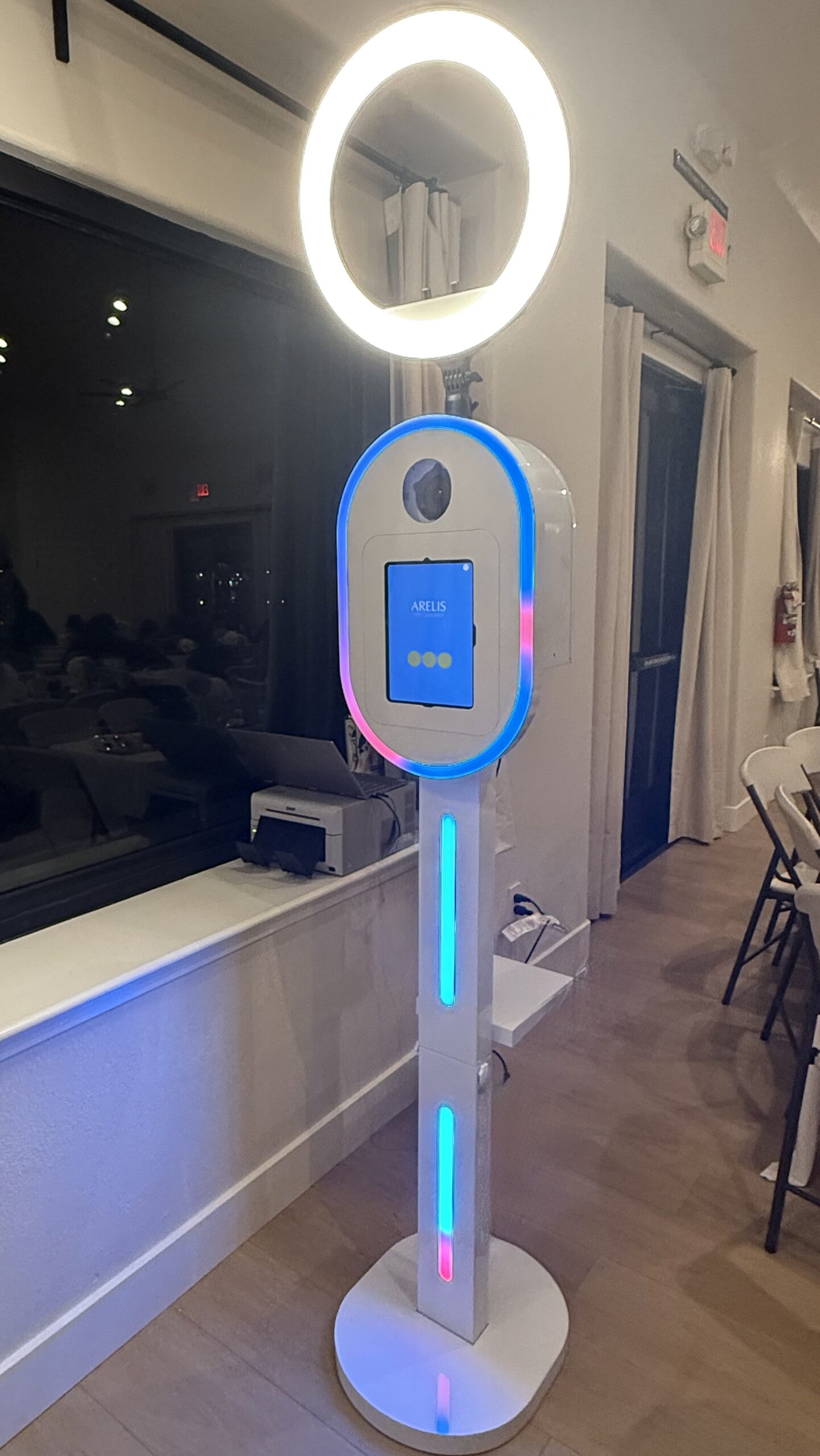 Close view of the Photo Party 209 booth with ring light and touchscreen